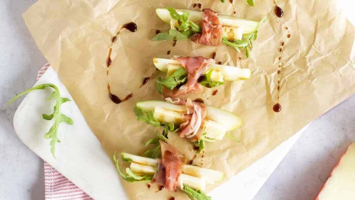 Prosciutto Wrapped Pears With Manchego.