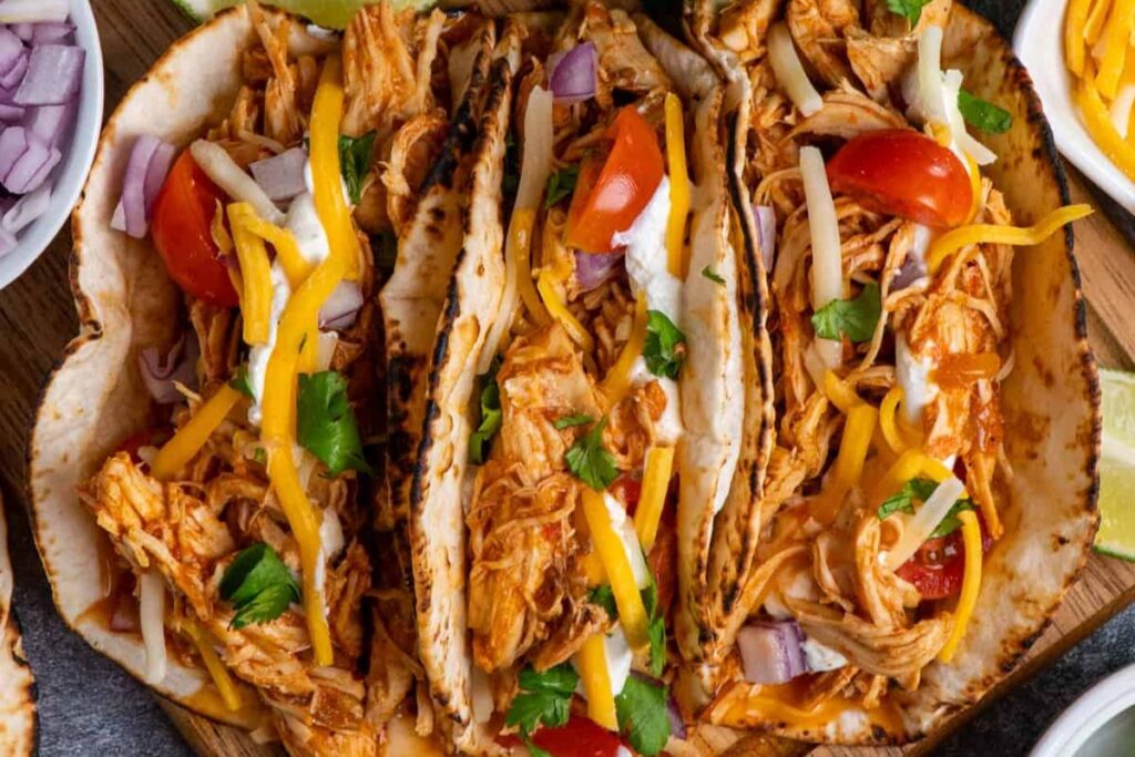 Slow Cooker Shredded Chicken Tacos.