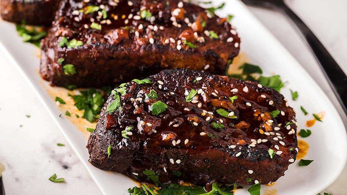 Slow Cooker Sriracha Honey Garlic Pork Chops.