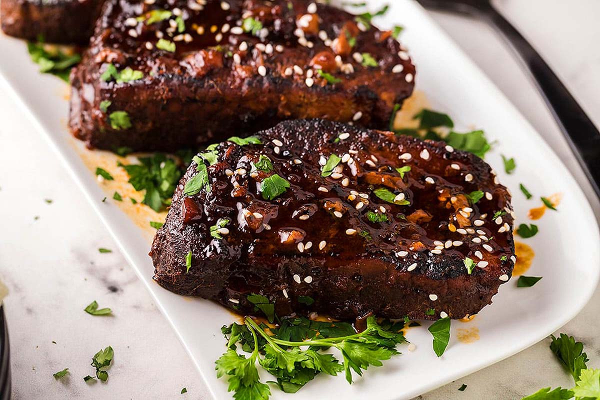 Slow Cooker Sriracha Honey Garlic Pork Chops;.